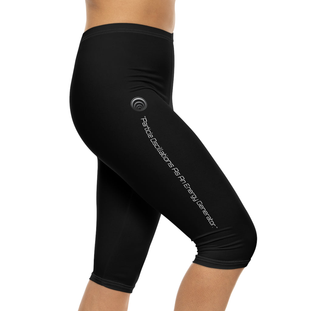 "Particle Oscillations As An Energy Generator."™ - Capri Leggings — Minimal Black Activewear with Subtle Vertical Text